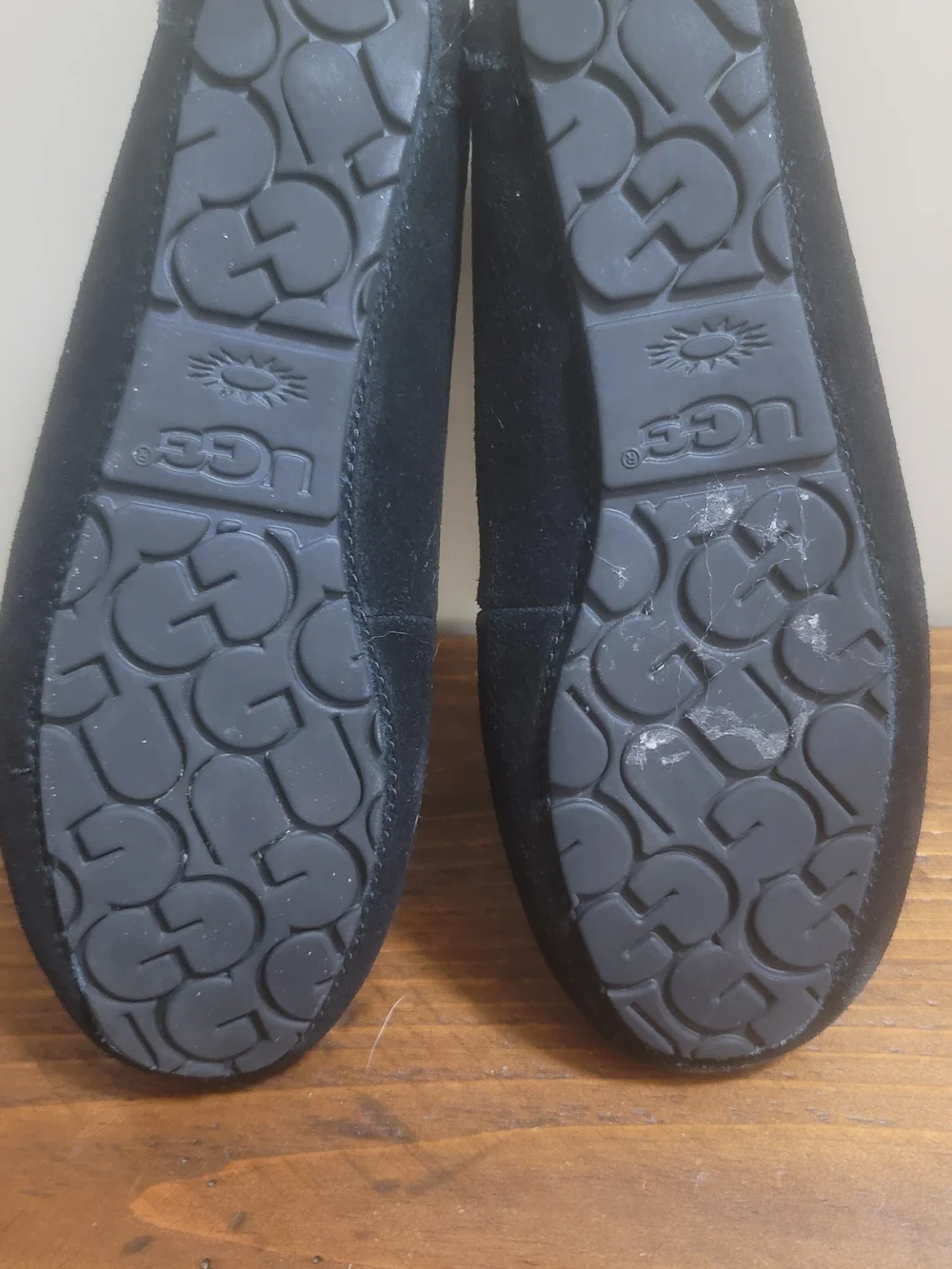 UGG  Black Suede Tassel Moccasin Slippers